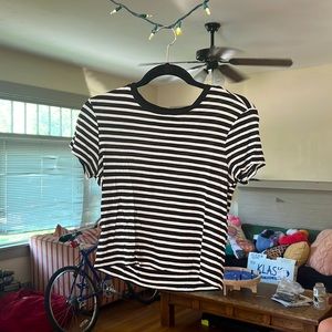 Cute flowy black & white striped t-shirt from Forever 21. Size Large in Juniors.